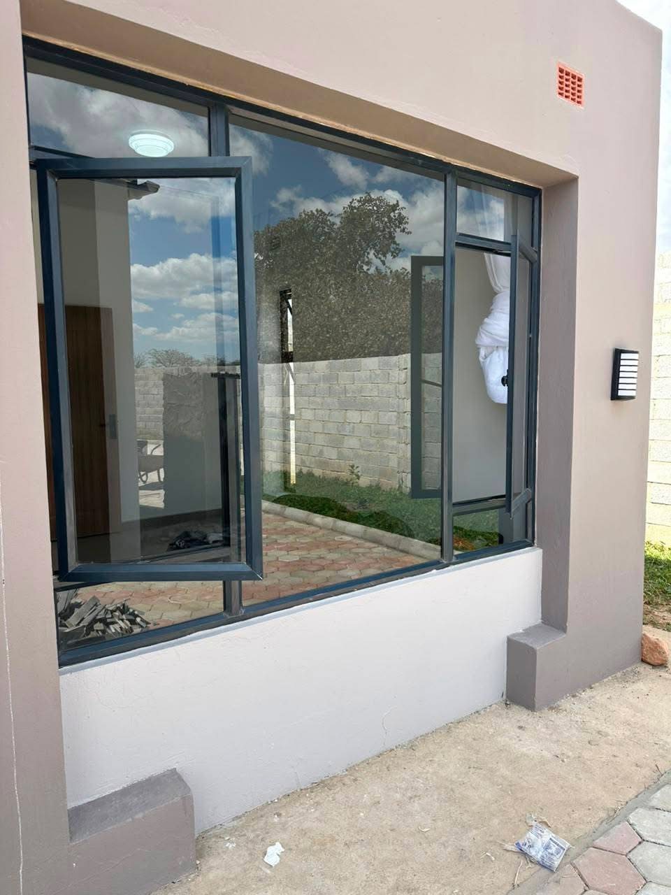 Large corner aluminium window installation
