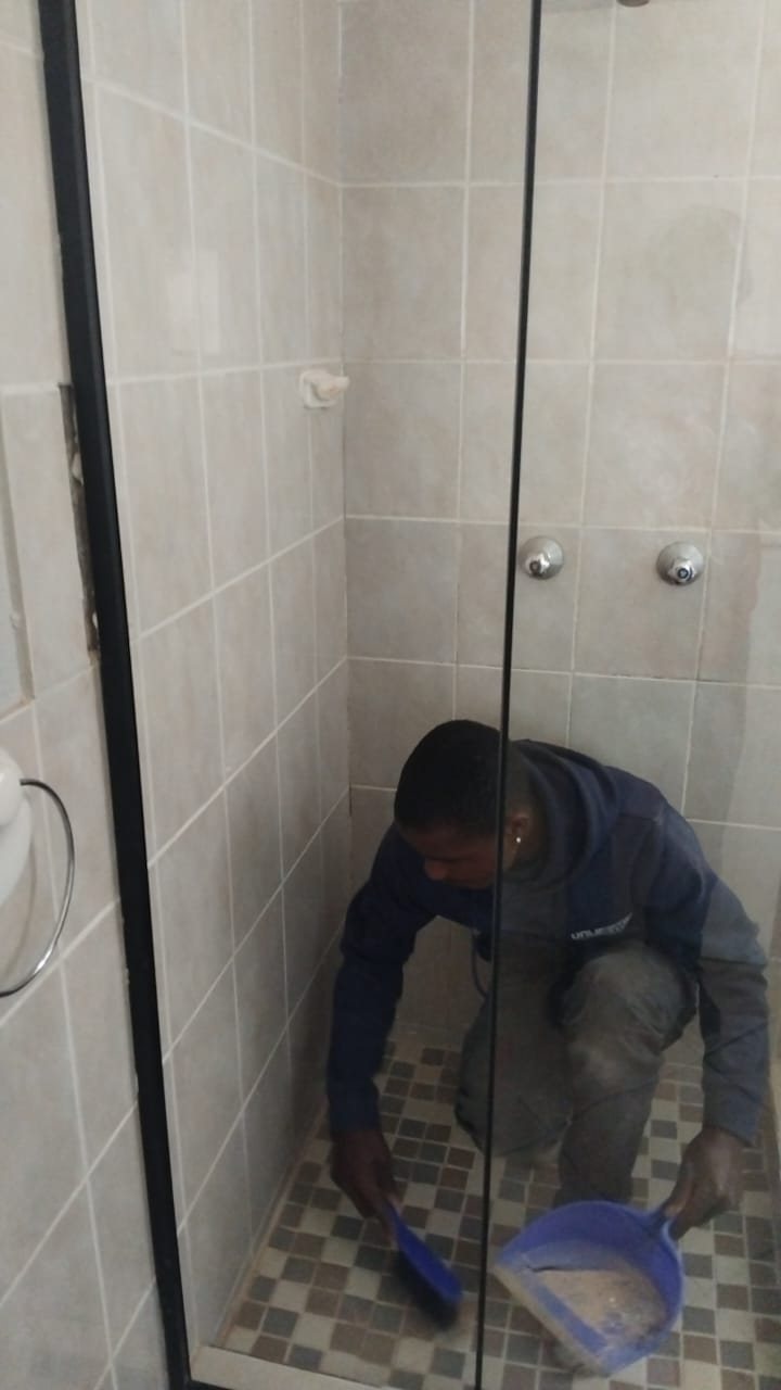 Shower door installation in progress
